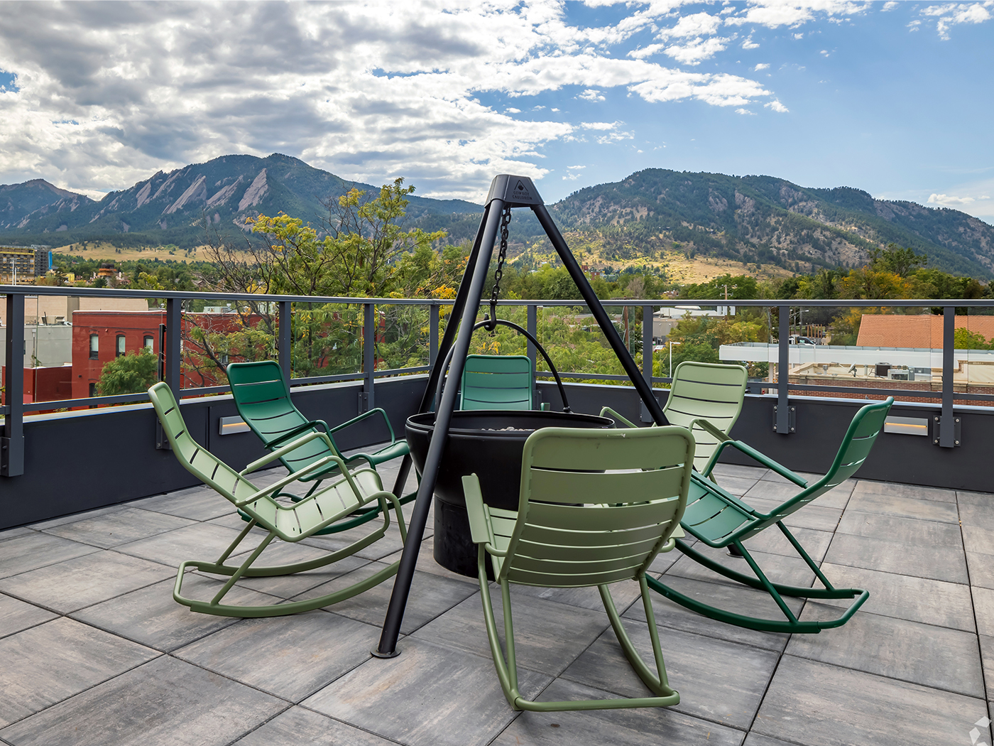 firepit with green chairs