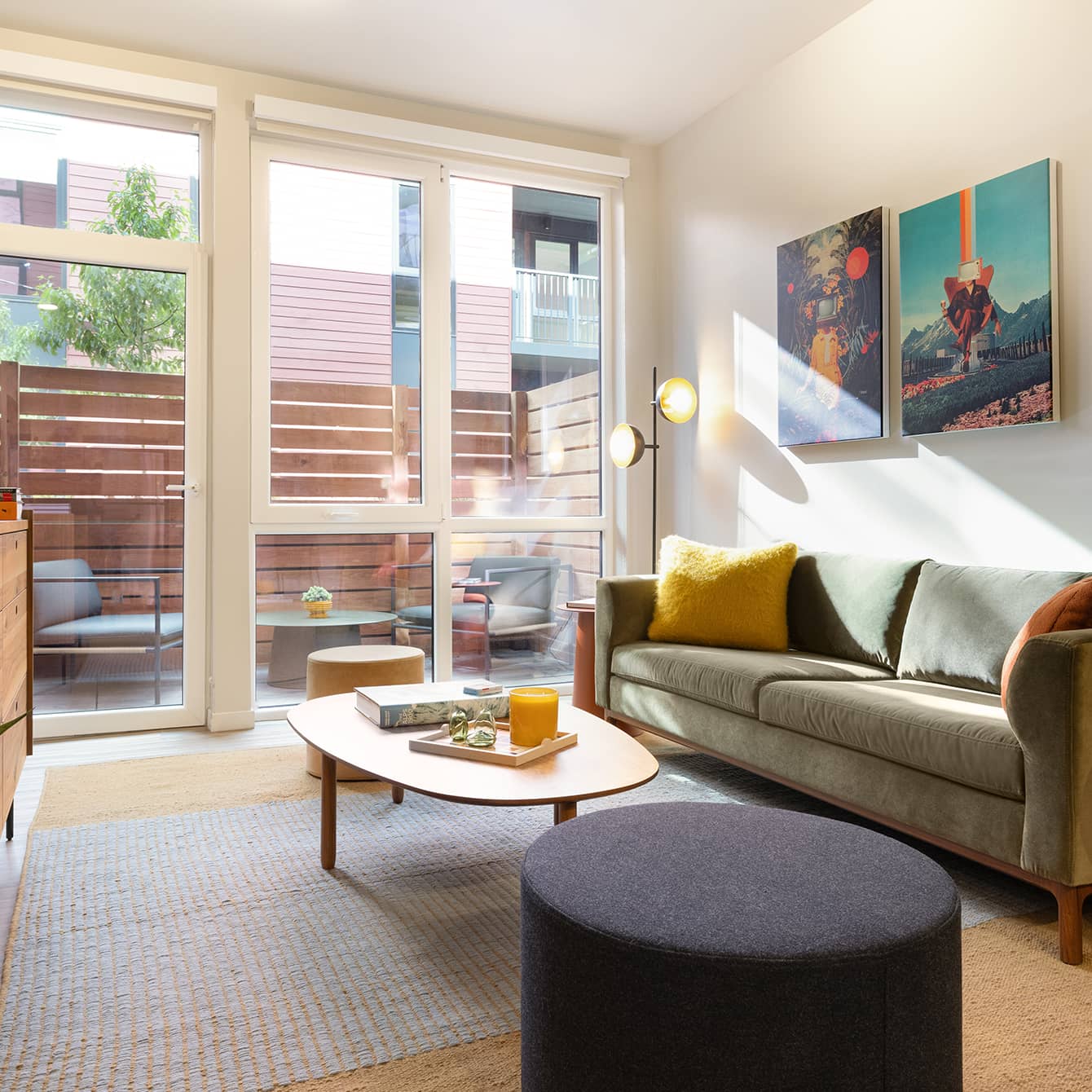 A living room with a couch and table